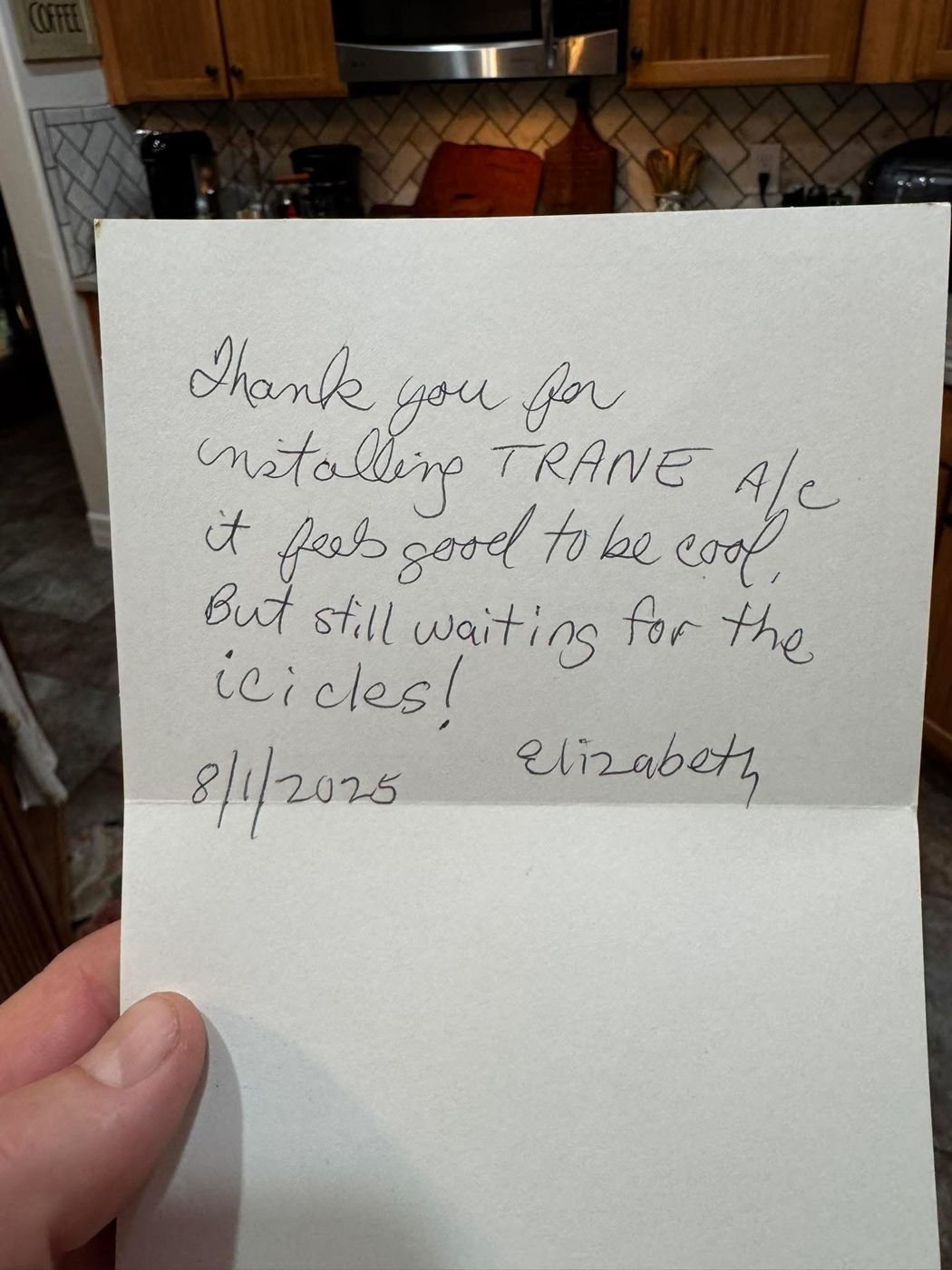 Handwritten thank-you note from a customer after a Trane AC install